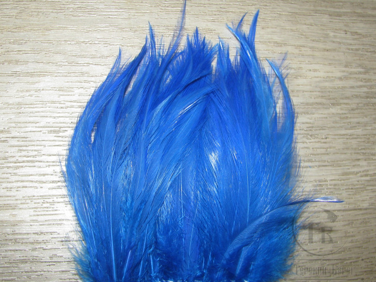 Перо скальпа петуха ярко синее (пнл) \ Strong neck hackle Bright Blue Терский Берег