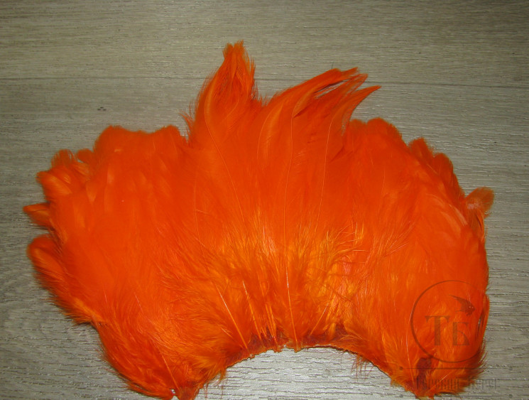 Перо петуха на коже лопаточное голубое Scapulars / Soft Hackle Feathers Orange